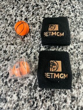 BETMGM wrist sweatbands and Orange Mini Basketball Keychain Set